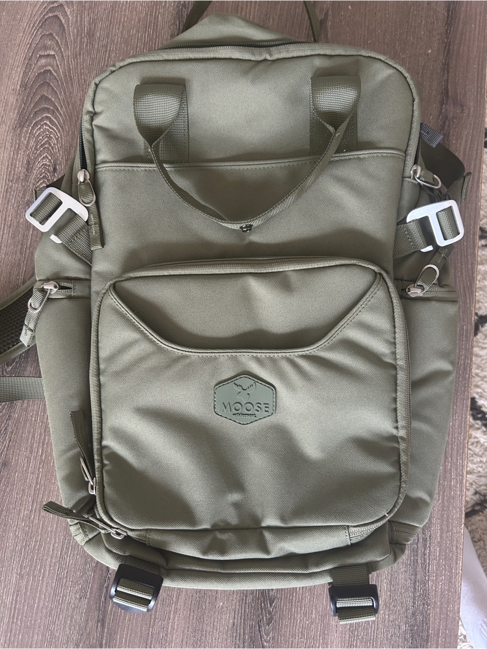 “Moose” brand Olive Green backpack. Used once.